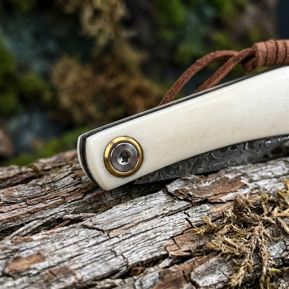 Outdoor Folding Knife Bull Bon - مراجعة Bone Folder Tool وسعره